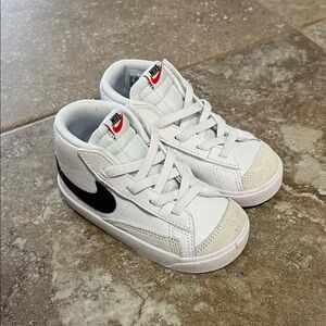 Nike Kids White Sneakers with Black Swoosh
